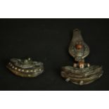 Two 19th century Tibetan white metal and brass purses. One inset with chunks of coral and the