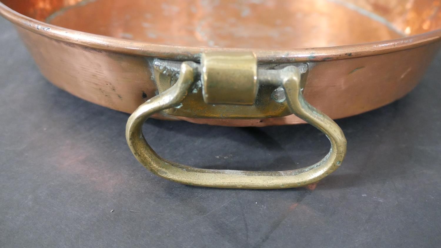 Two 18th century pewter plates with impressed makers mark along with a twin handled Victorian copper - Image 10 of 10