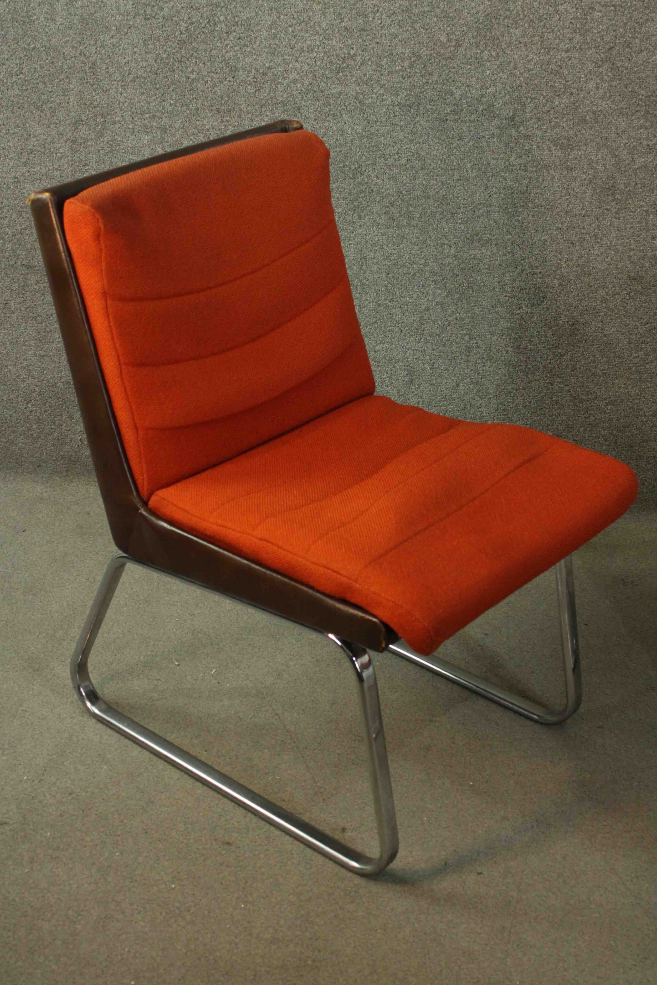 Gordon Russell for Verco, an office chair, upholstered in red fabric, with a leather frame, on - Image 3 of 7