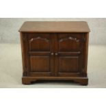 The Burley Butler; an oak heated sideboard electric food warmer, with a rising lid and two