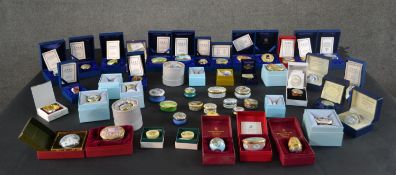 A collection of approximately fifty decorative trinket and music boxes, various designs. Makes