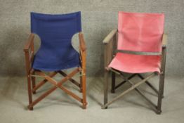 Two directors or campaign style folding teak chairs one with a blue canvas seat and back the other
