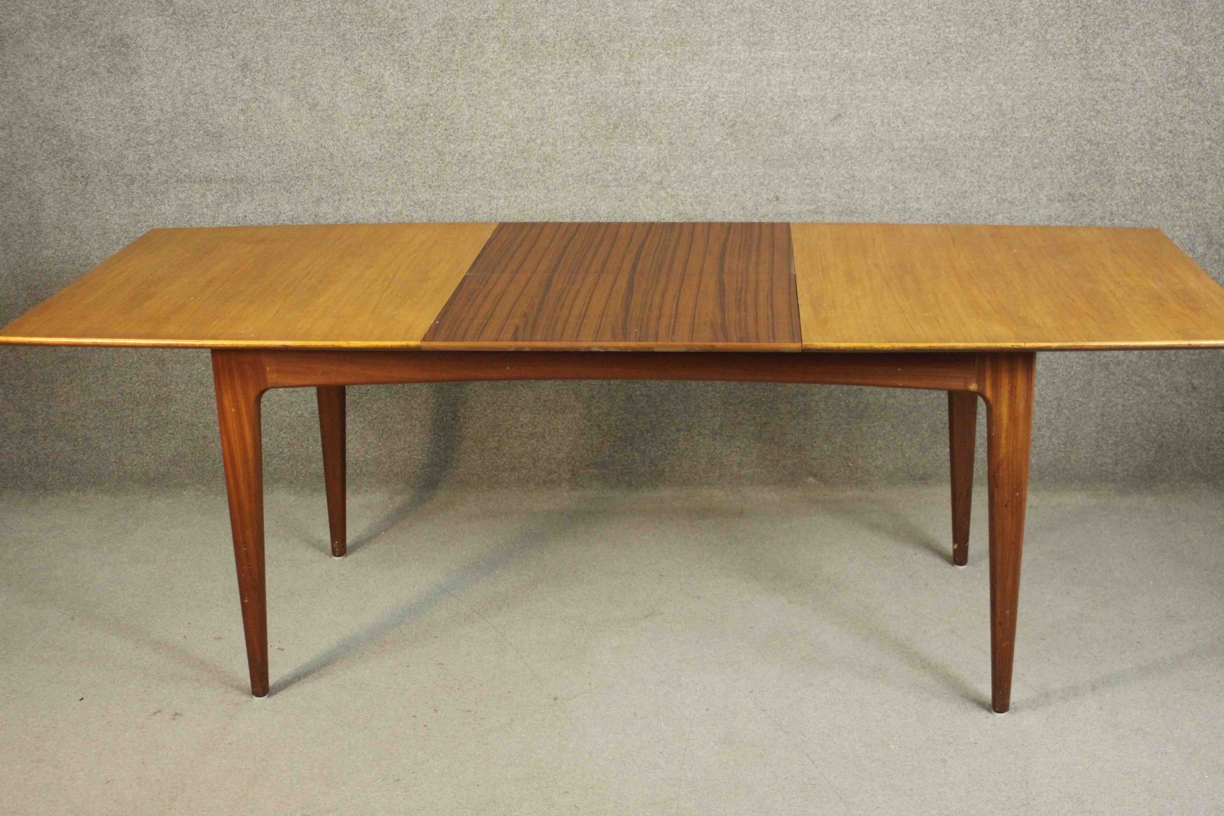 A circa 1960s teak extending dining table, of rectangular form with an additional leaf, on - Image 7 of 10