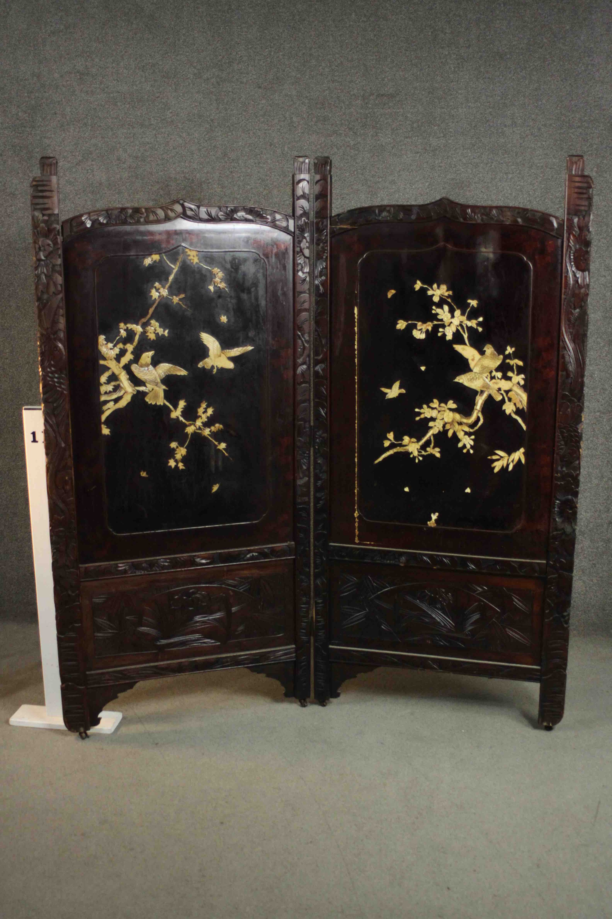 A late 19th or early 20th century Japanese two fold lacquered screen with carved bone inlaid - Image 2 of 10