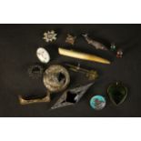A collection of silver jewellery, including various Danish silver brooches, a taj mahal charm,