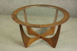 Victor B Wilkins for G-Plan, a 1960s teak Astro circular coffee table, with a circular plate glass