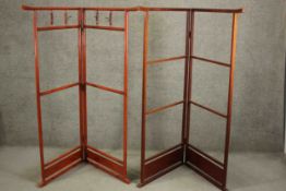 Two Japanese hardwood folding screens, possibly valet stands, one with clothes hooks. H.154 W.155cm.