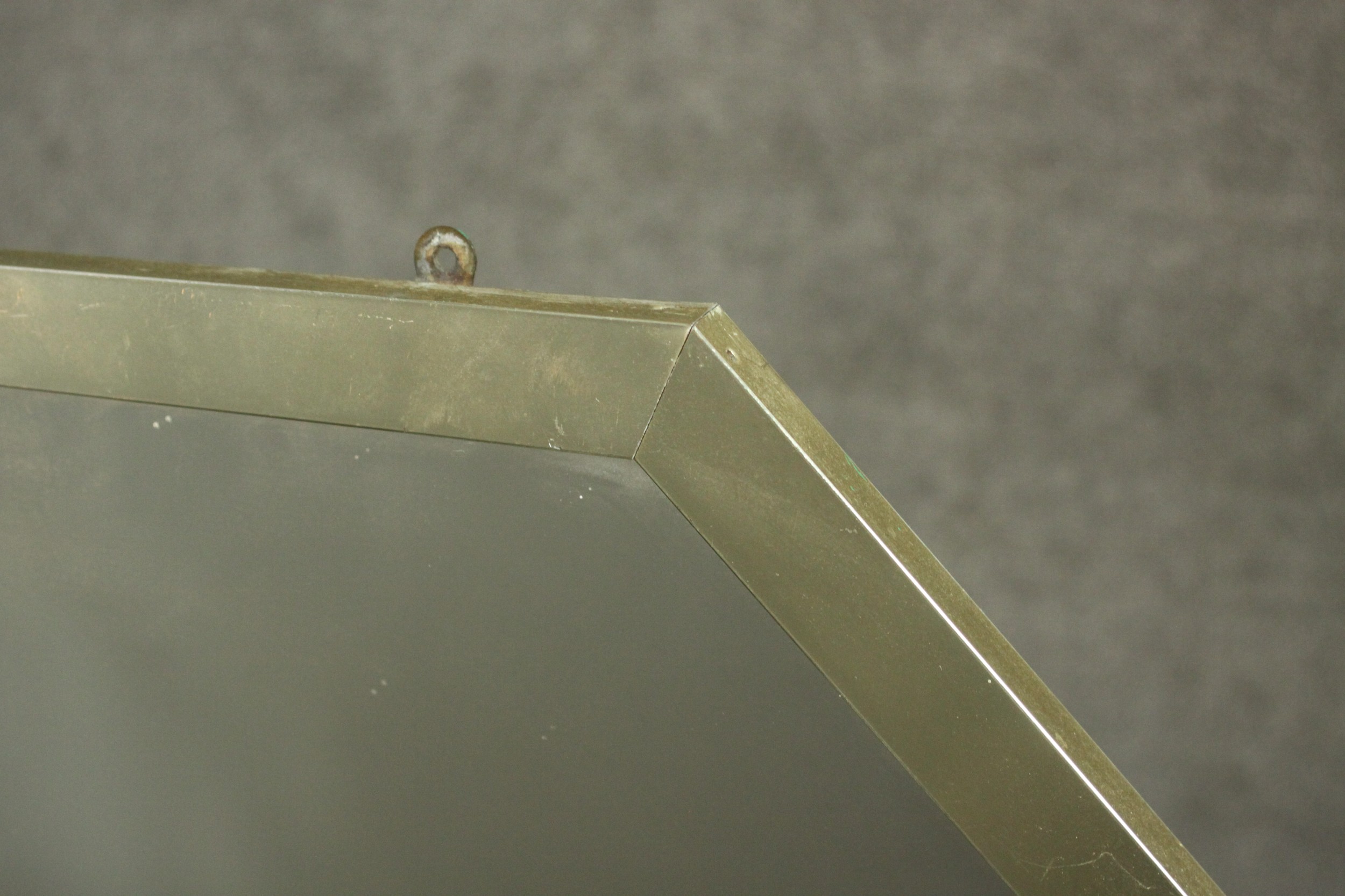 A modernist mirror of square form with canted top corners in a metal frame. H.52 W.50cm. - Image 3 of 4