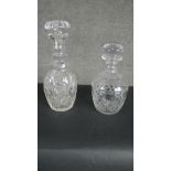 Two early 20th century hand cut crystal decanters with stoppers, one with a star cut base. H.30 D.