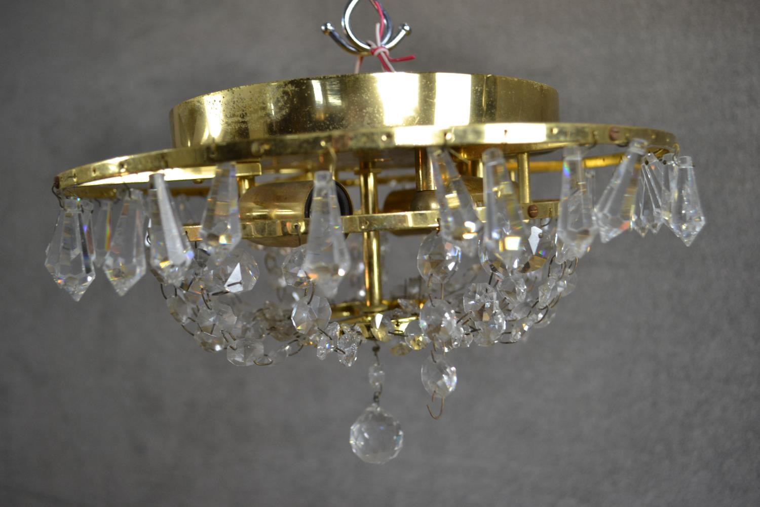 A contemporary circular tiered brass ceiling light, hung with faceted glass lustres. Diam.32cm - Image 4 of 5