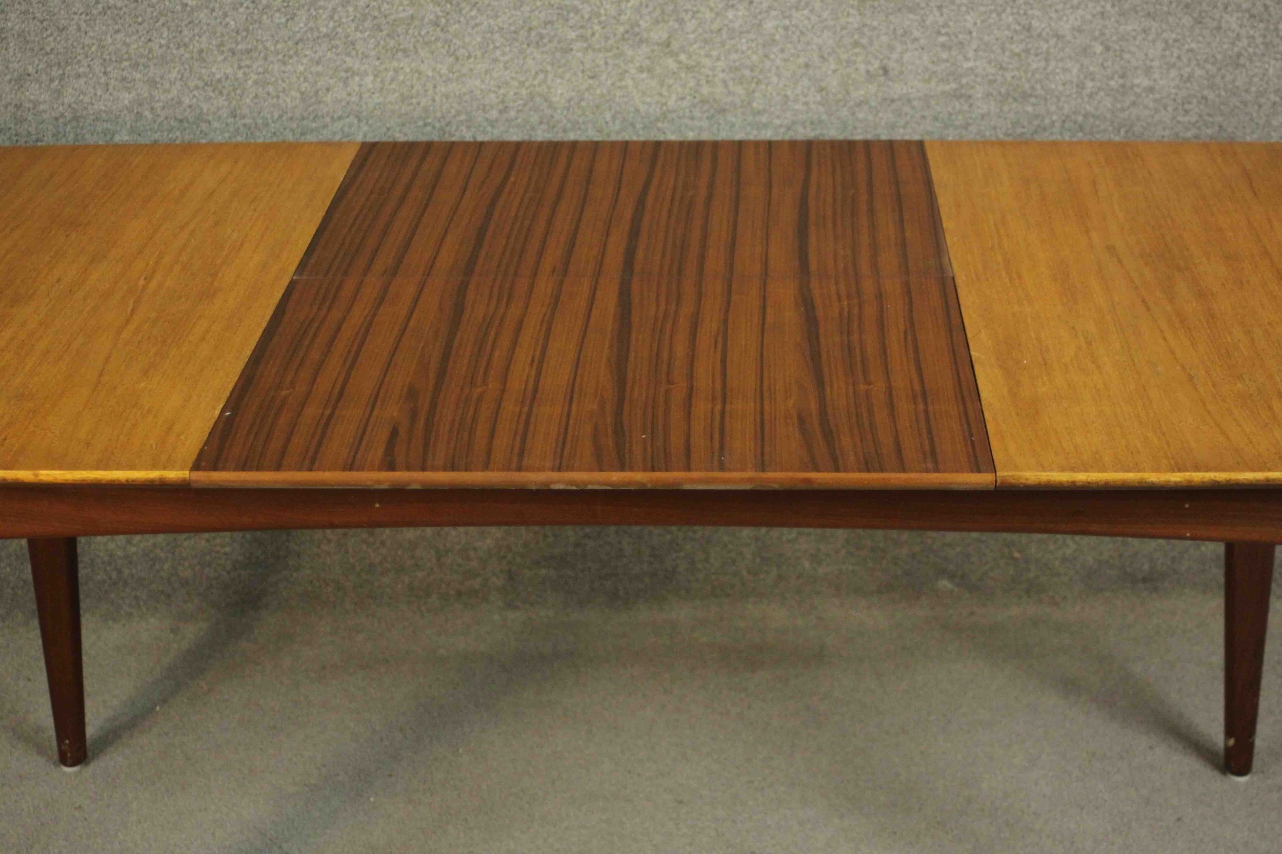 A circa 1960s teak extending dining table, of rectangular form with an additional leaf, on - Image 8 of 10