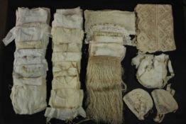 A large collection of Victorian child's clothes, christening robes, lace, linen and textiles.