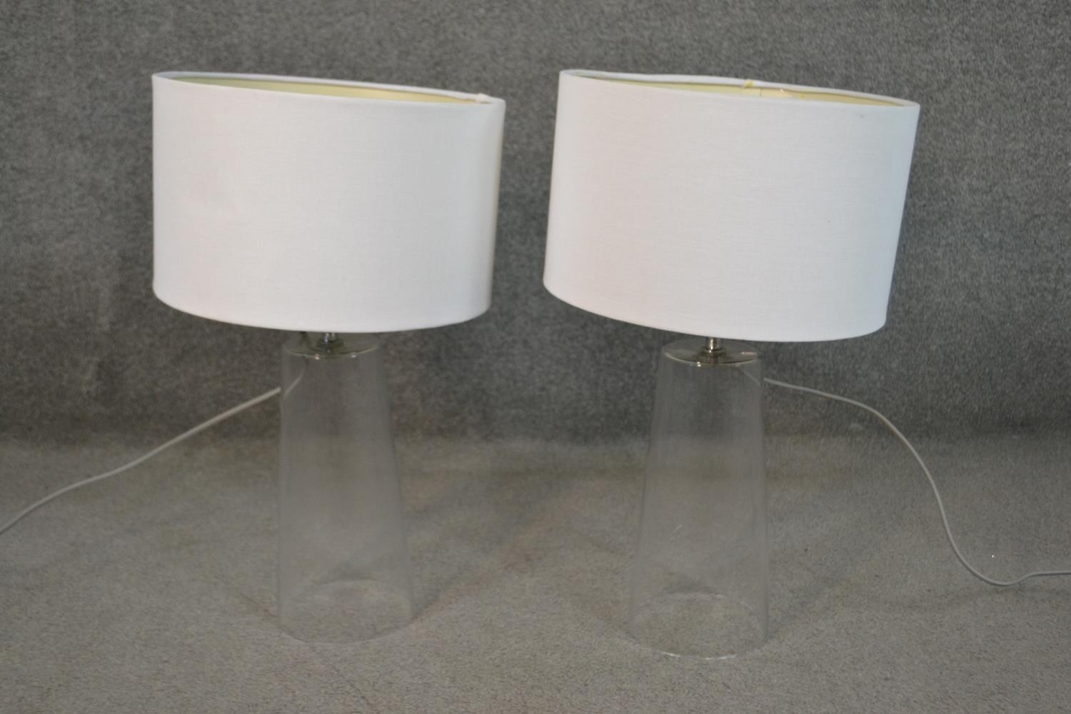 A pair of contemporary glass table lamps of slightly conical form with white shades. H.45cm - Image 2 of 5