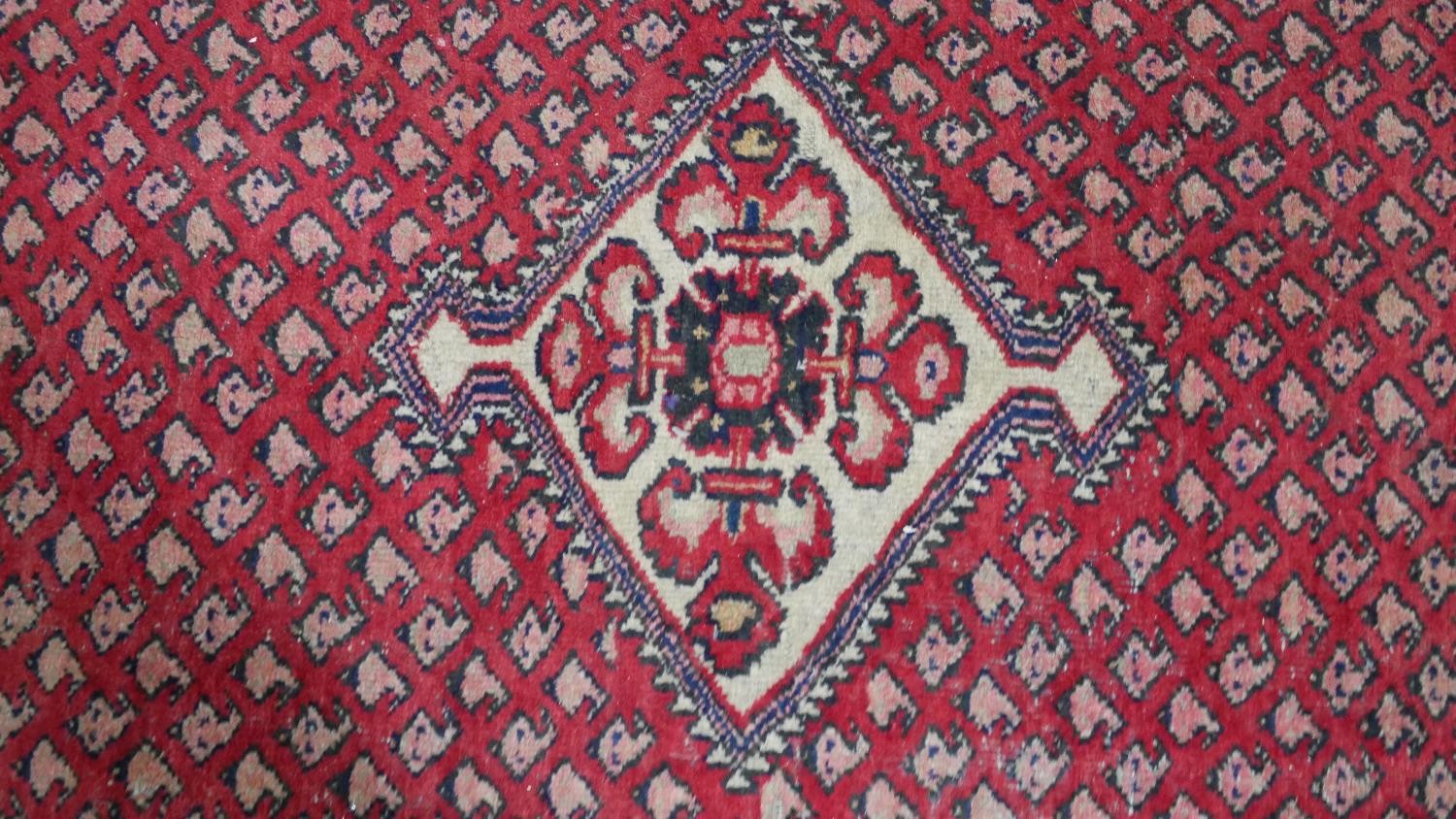 A red ground handmade Persian sarouk rug. L.204 H.130cm - Image 3 of 5