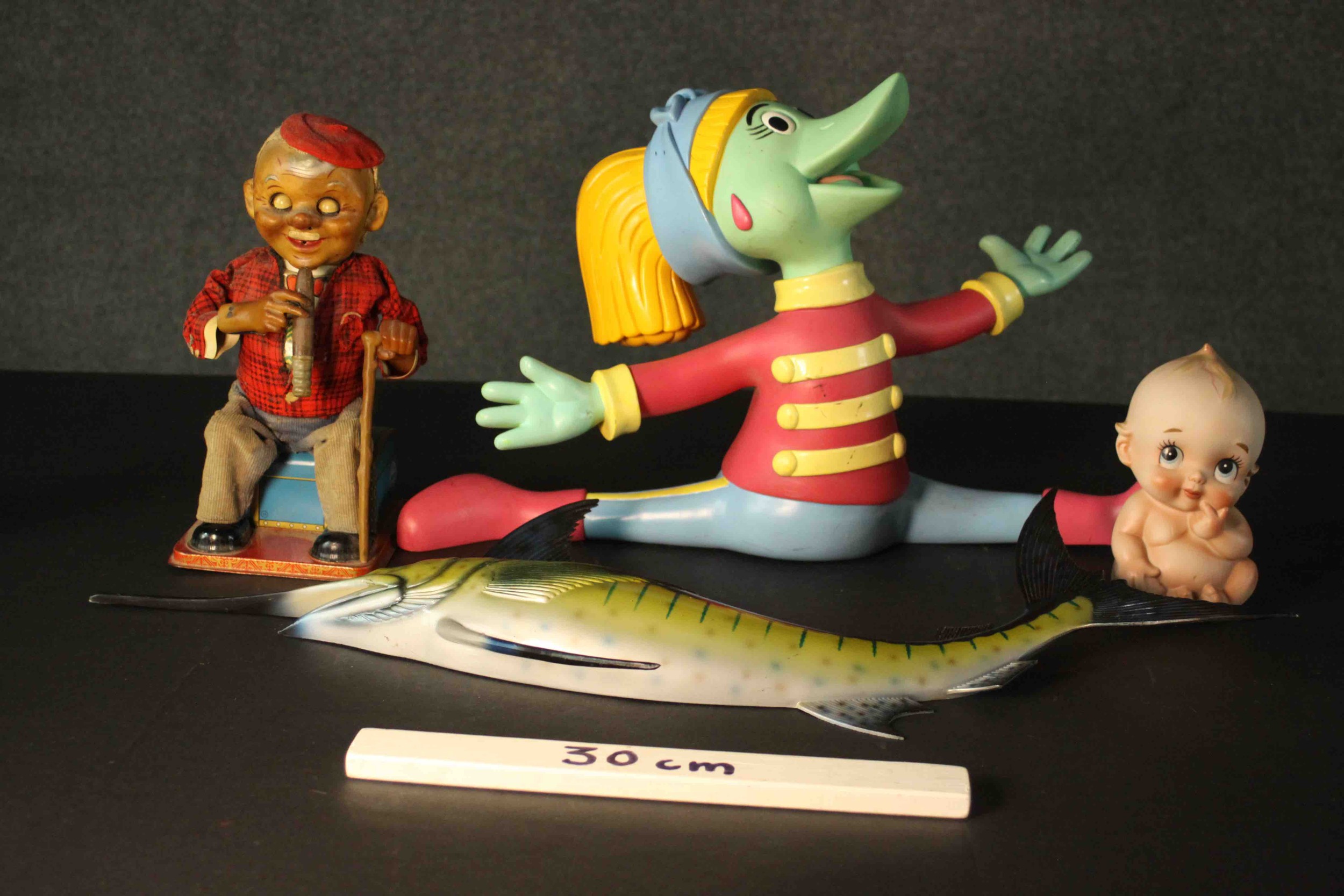 Three vintage toy characters and a fibreglass wall mounted swordfish. The wind up tin plate toy an - Image 2 of 7