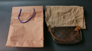 Louis Vuitton, a monogram Pochette accessories handbag, crafted from the maker's classic monogram