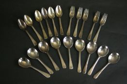A collection of Harrods silver plated cutlery, including six grapefruit spoons, five fruit forks and