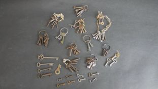 A large collection of approximately fifty antique keys.