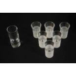 Two sets of six contemporary Salviati Italian glass 'Dune' shot glasses, with engraved decoration,