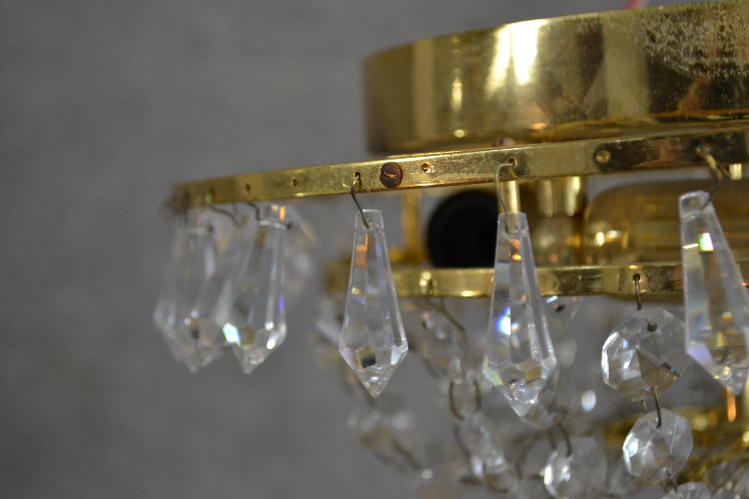 A contemporary circular tiered brass ceiling light, hung with faceted glass lustres. Diam.32cm - Image 2 of 5