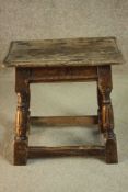 A 17th century and later oak joynt stool, the rectangular seat with a moulded edge over a moulded