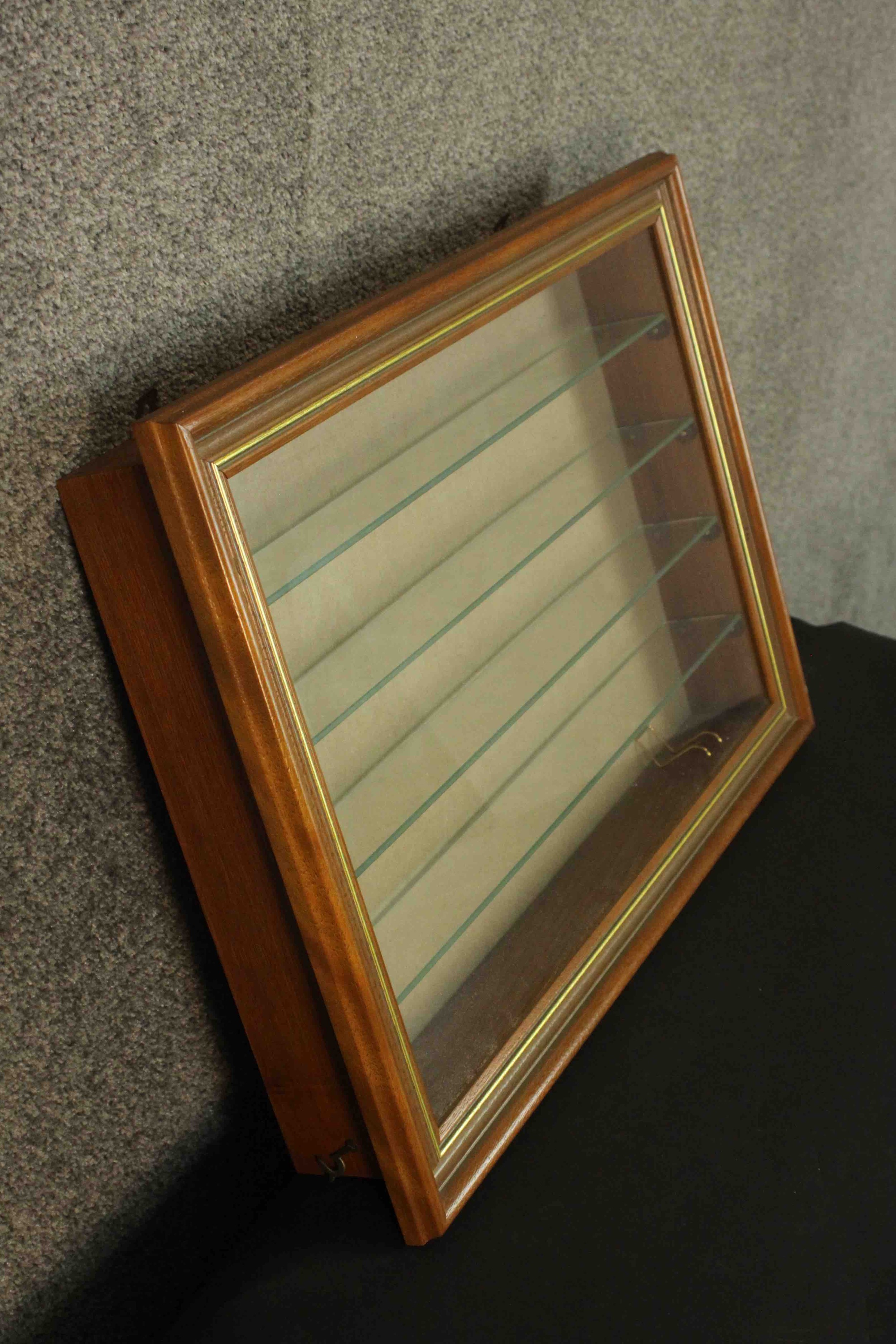 A teak display cabinet, with a glazed rising door, enclosing four glass shelves. H.42 W.60 D.9cm. - Image 8 of 9