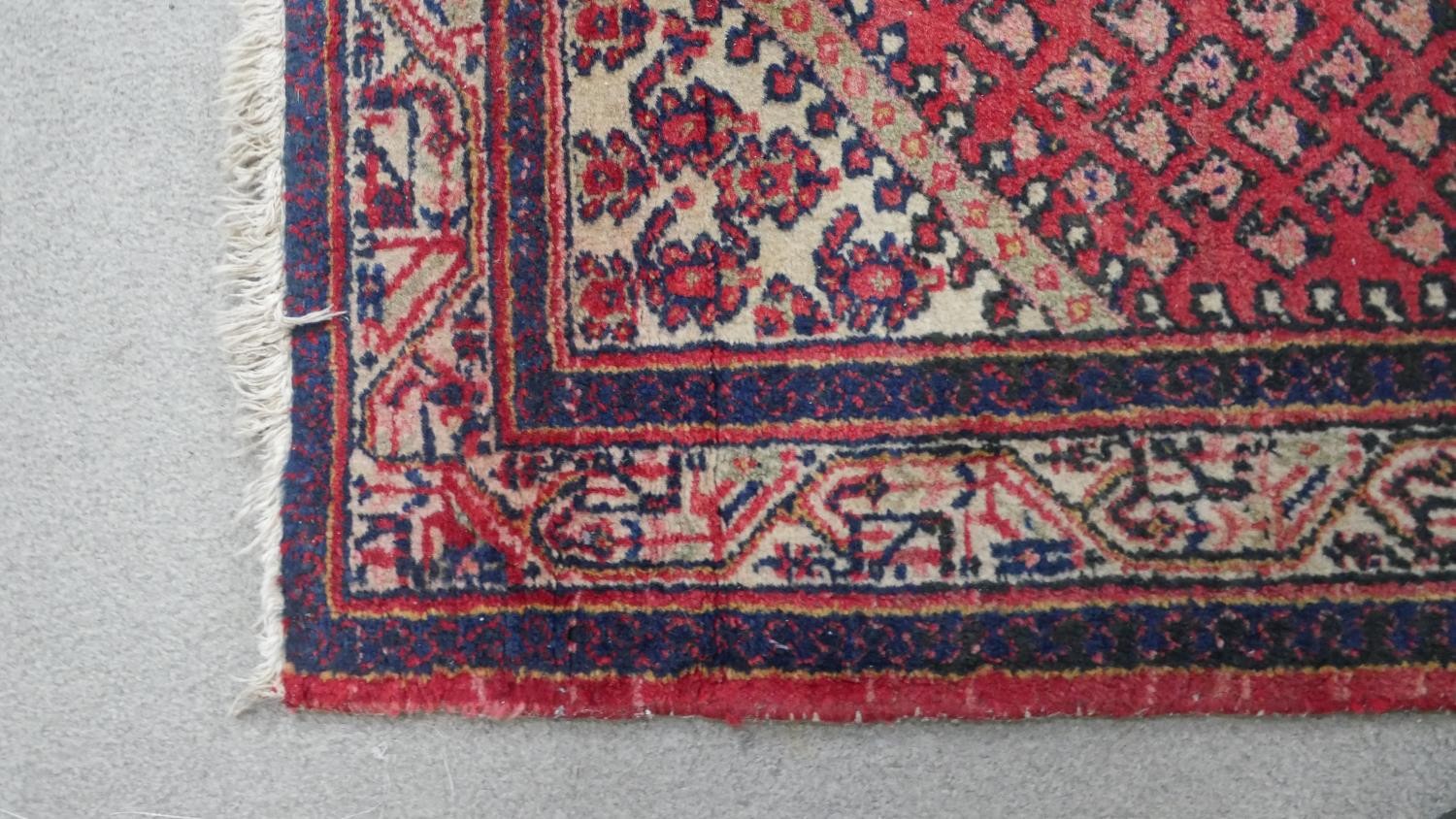 A red ground handmade Persian sarouk rug. L.204 H.130cm - Image 5 of 5