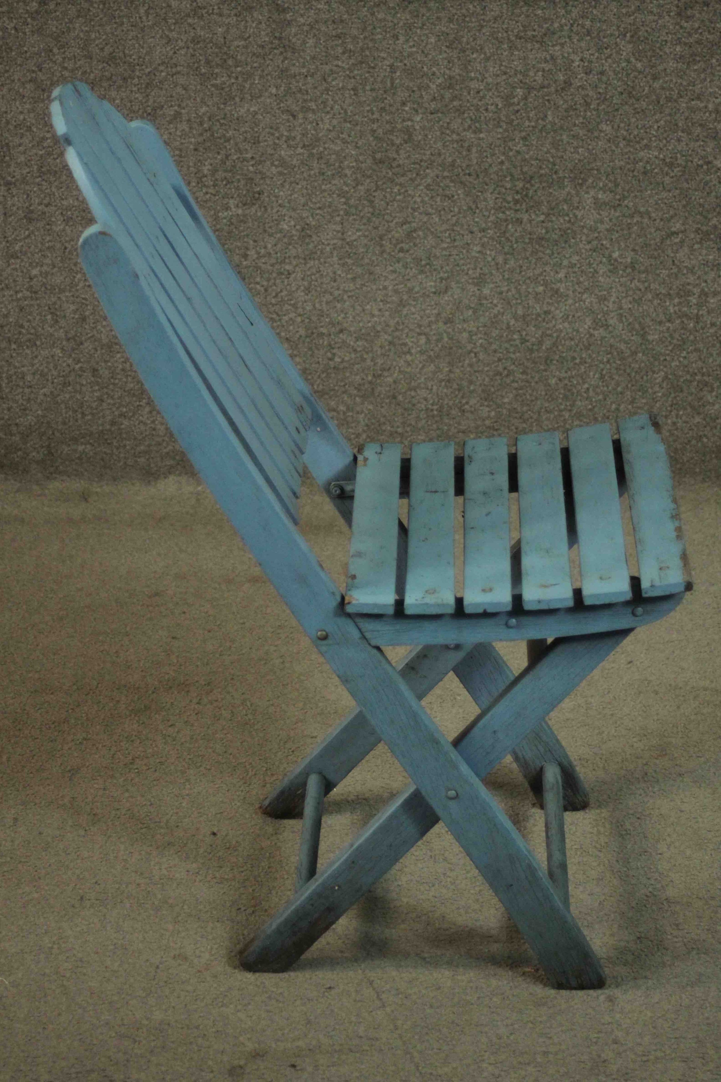 A set of four blue painted folding garden chairs with slatted backs and seats. - Image 4 of 7