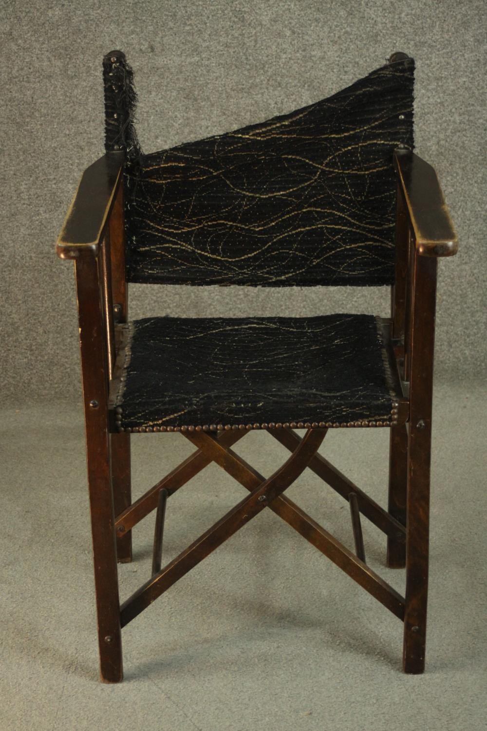 A 20th century 'Firma' folding campaign chair, upholstered in black fabric (damaged), made at the - Image 2 of 8