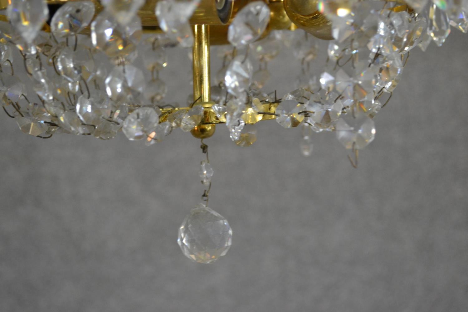 A contemporary circular tiered brass ceiling light, hung with faceted glass lustres. Diam.32cm - Image 3 of 5