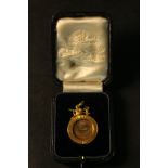 A leather cased Victorian 18 carat National Angling Club 1880 medal with engraved lettering and