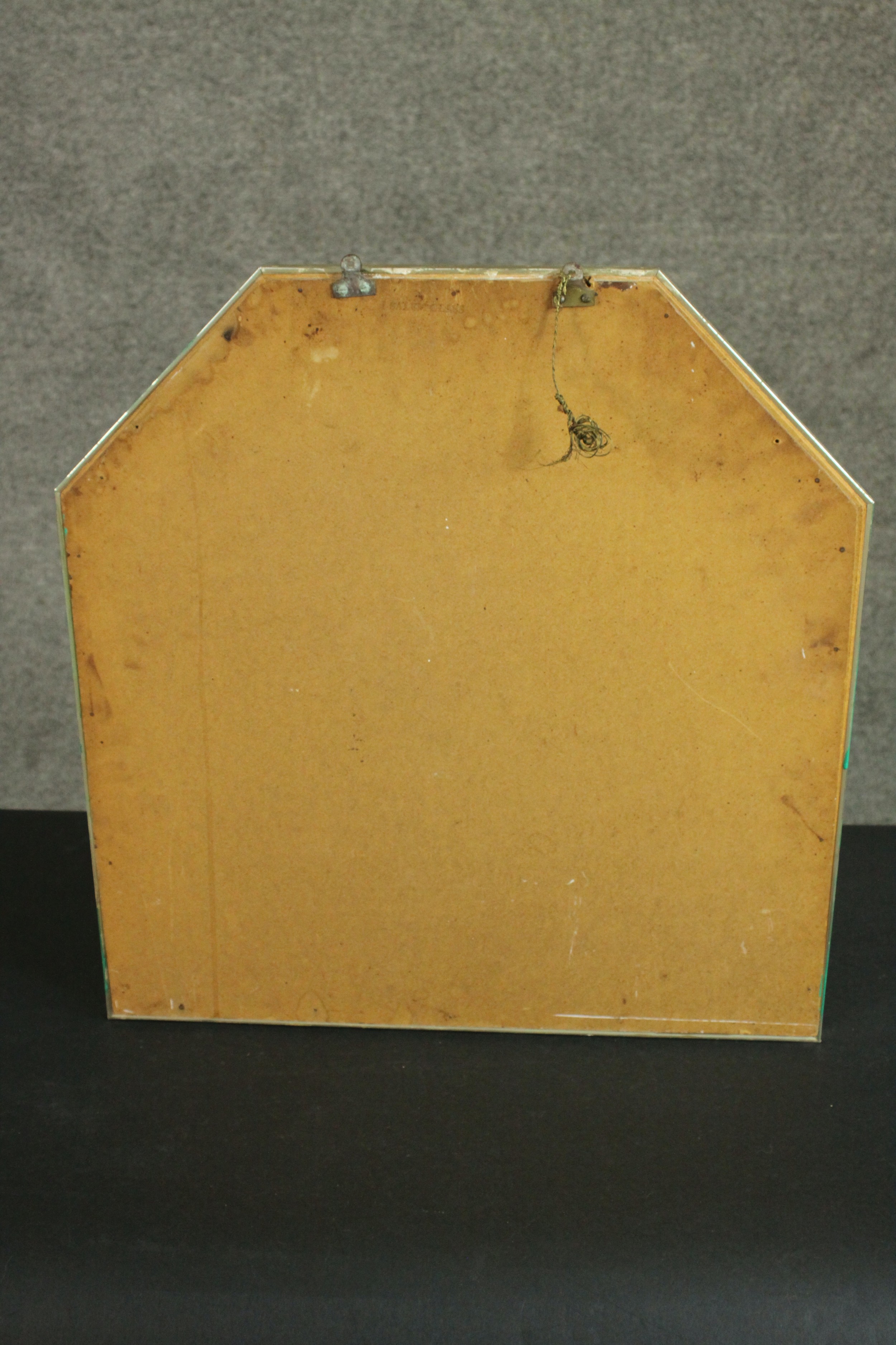 A modernist mirror of square form with canted top corners in a metal frame. H.52 W.50cm. - Image 4 of 4