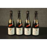 A boxed set of four unopened bottles of French sparkling wine, Kriter Leger, 1973. H.8 W.47 D.