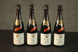 A boxed set of four unopened bottles of French sparkling wine, Kriter Leger, 1973. H.8 W.47 D.