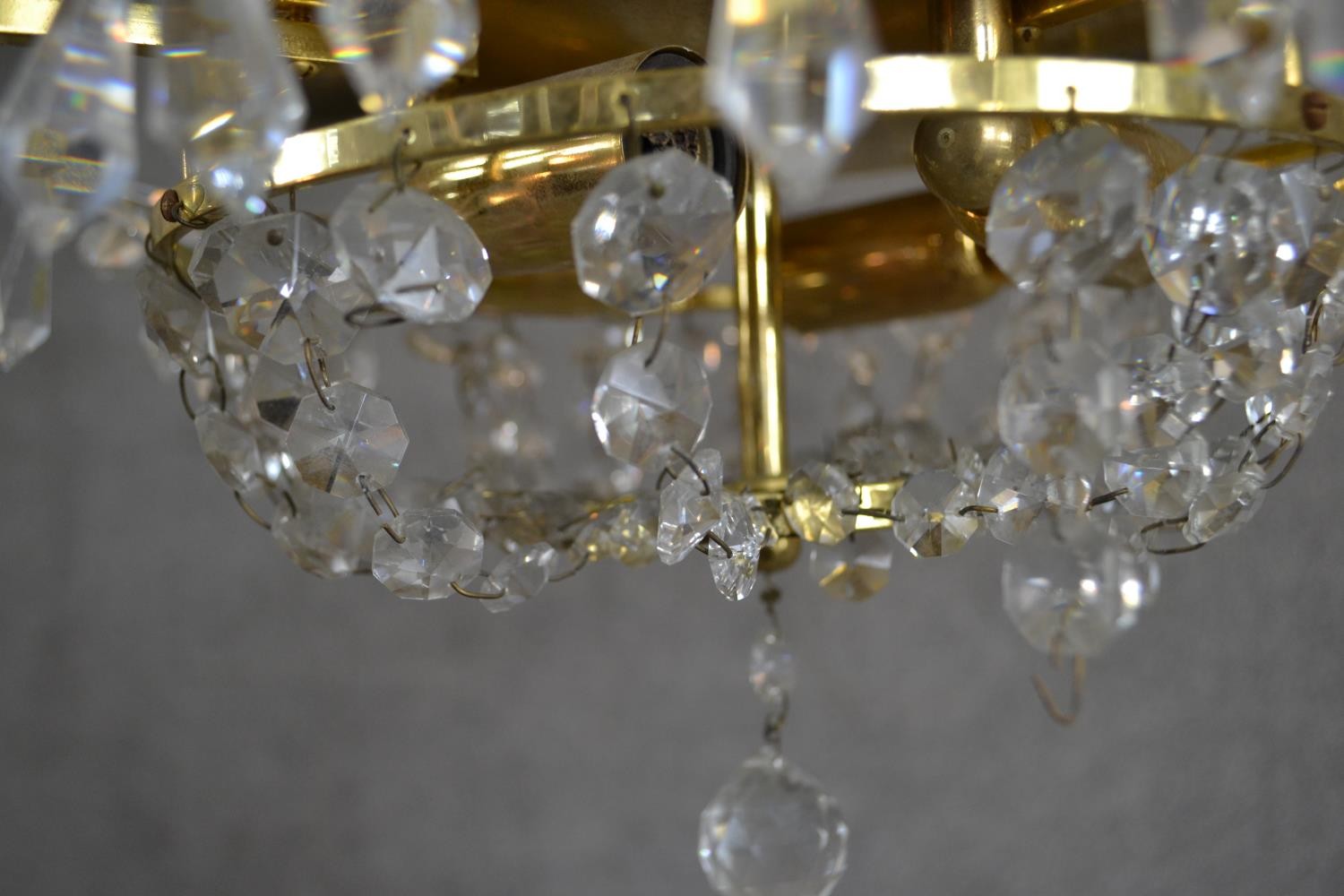 A contemporary circular tiered brass ceiling light, hung with faceted glass lustres. Diam.32cm - Image 5 of 5
