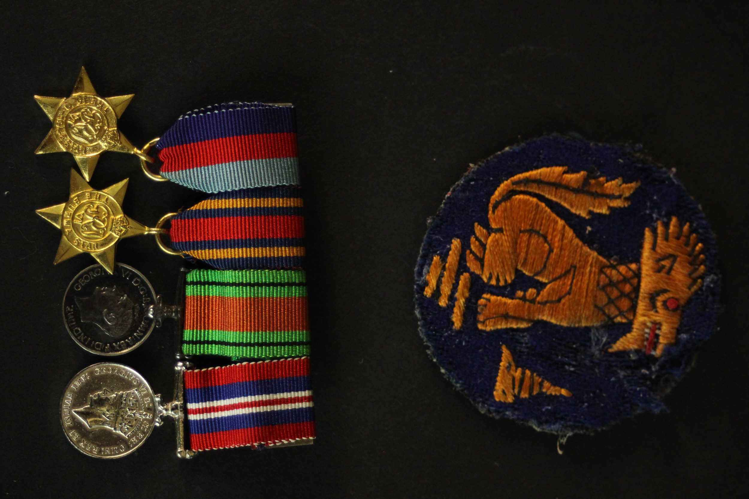 A large collection of various militaria medals and badges, including two silver and enamel - Image 8 of 8