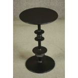 A contemporary Room & Board occasional table. H.57 Dia. 36cm.