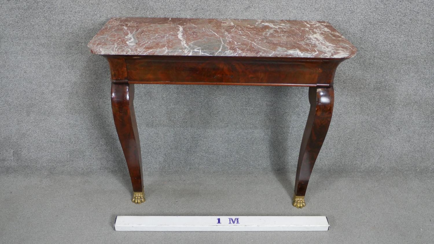 A continental Empire style flame mahogany console table with a marble top on cabriole legs with gilt - Image 2 of 5