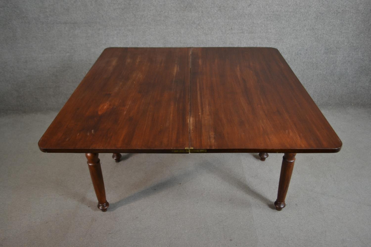 A Victorian walnut tea table of rectangular form with a fold over top on turned legs. H.70 W.116 D. - Image 3 of 6