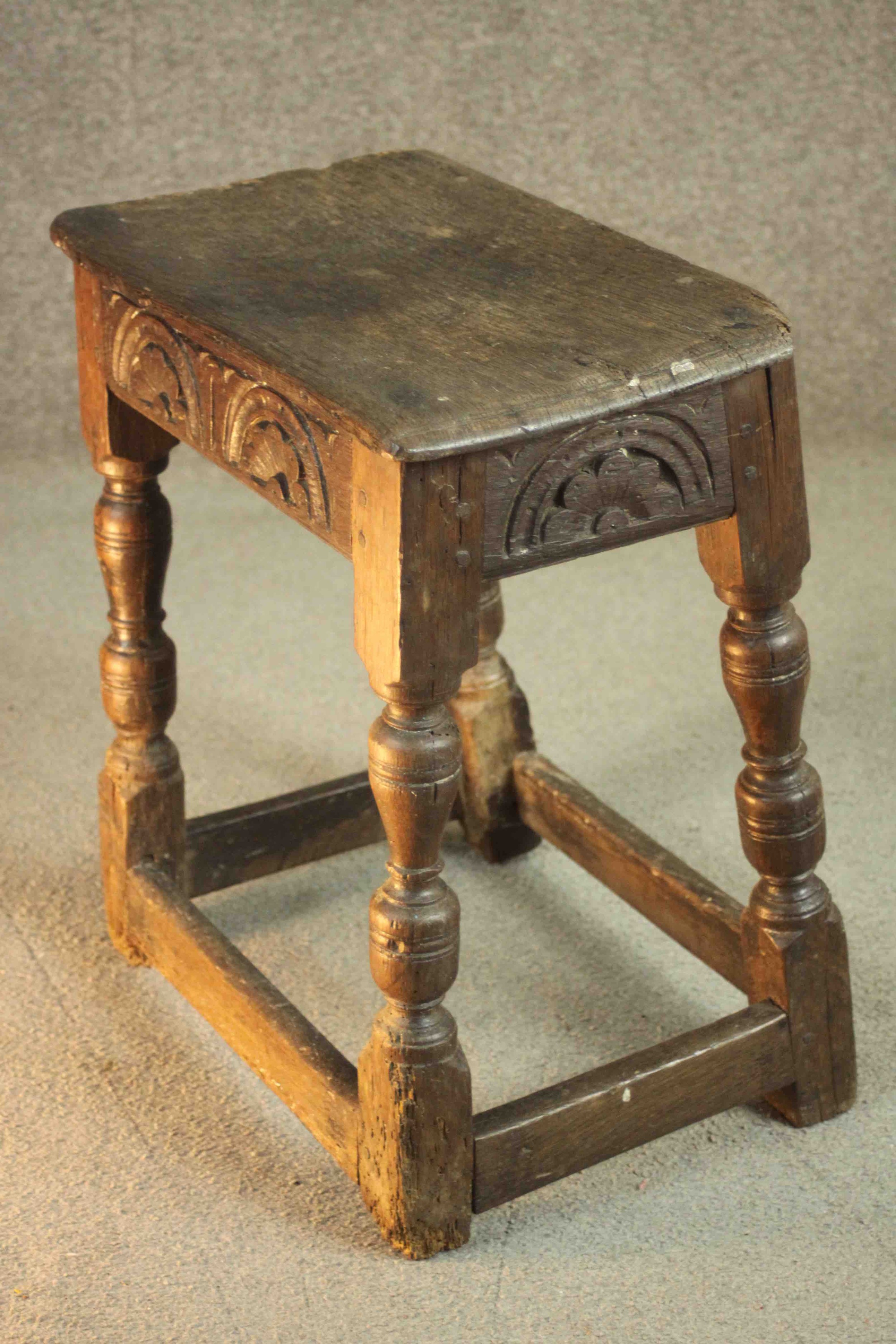 A 17th century and later oak joynt stool, the rectangular seat with a moulded edge over a carved - Image 4 of 7