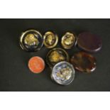 Five Bimini style pressed gold and black buttons with a classical profile with fish (three large and