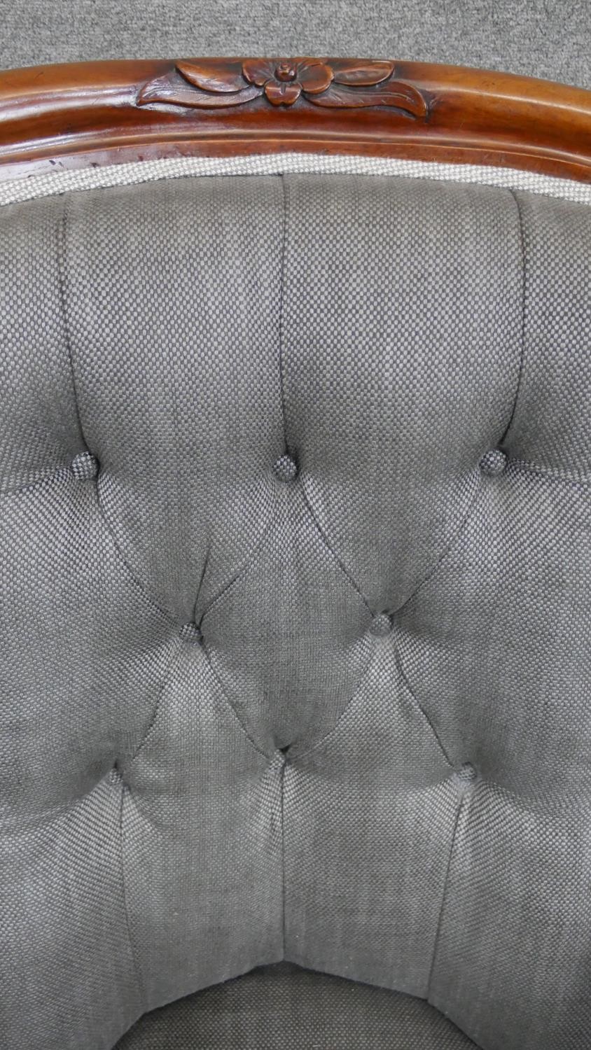 A Victorian walnut open armchair upholstered in grey fabric with a buttoned back over a serpentine - Image 3 of 5