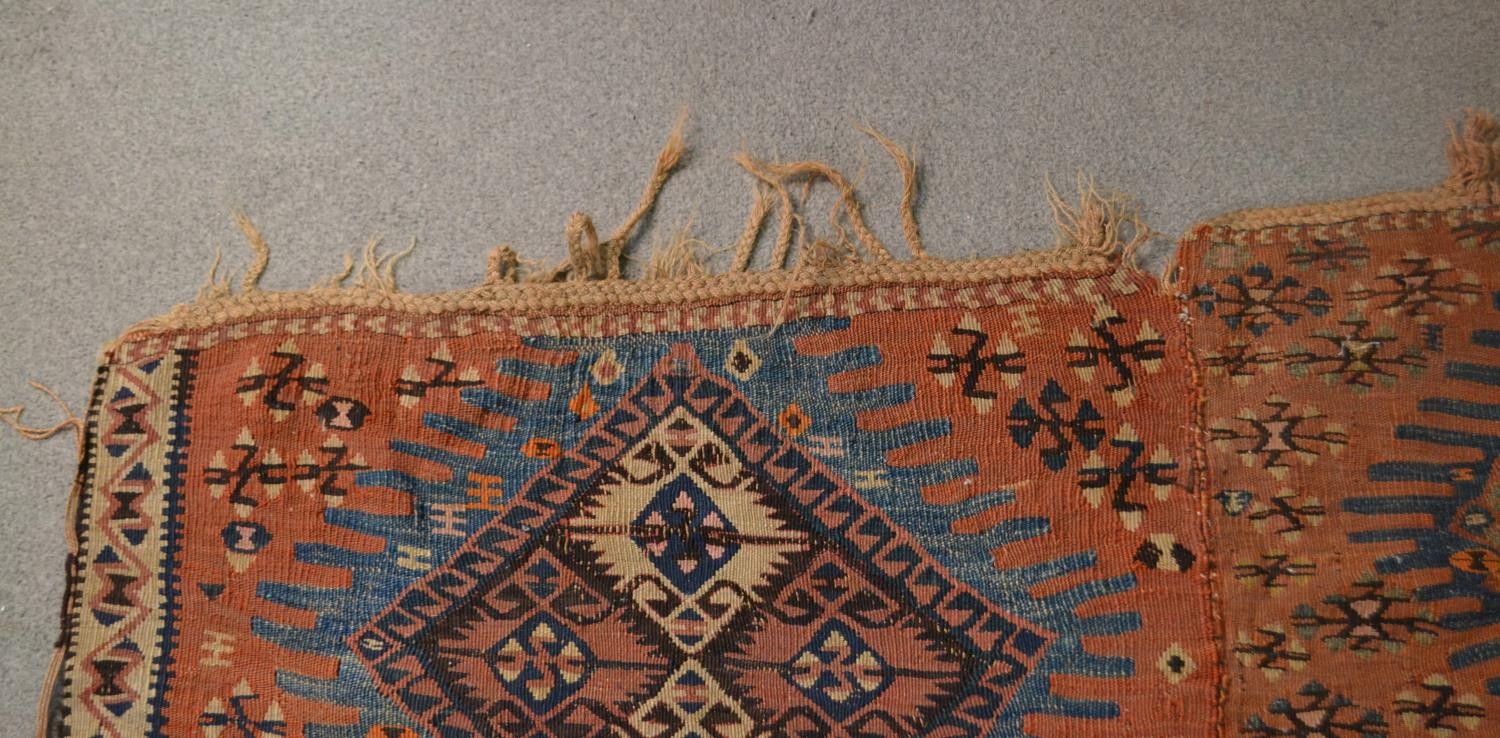 Two joined Persian Kelims, repeating diamond medallions on a burgundy ground. L.232 W.163cm - Image 6 of 6