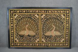 A very large framed and glazed Indian textile with gold embroidered threads depicting two peacocks