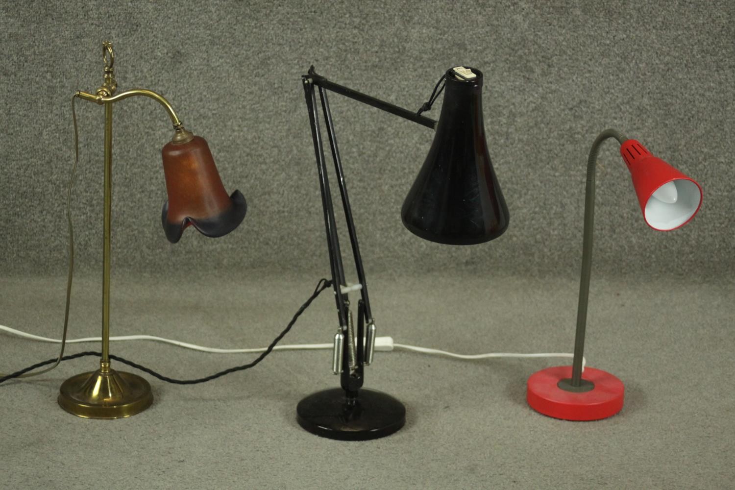 A Herbert Terry style black Anglepoise desk lamp, together with a mid to late 20th century red