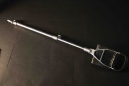 A vintage black leather and chrome shooting stick. L.90cm.