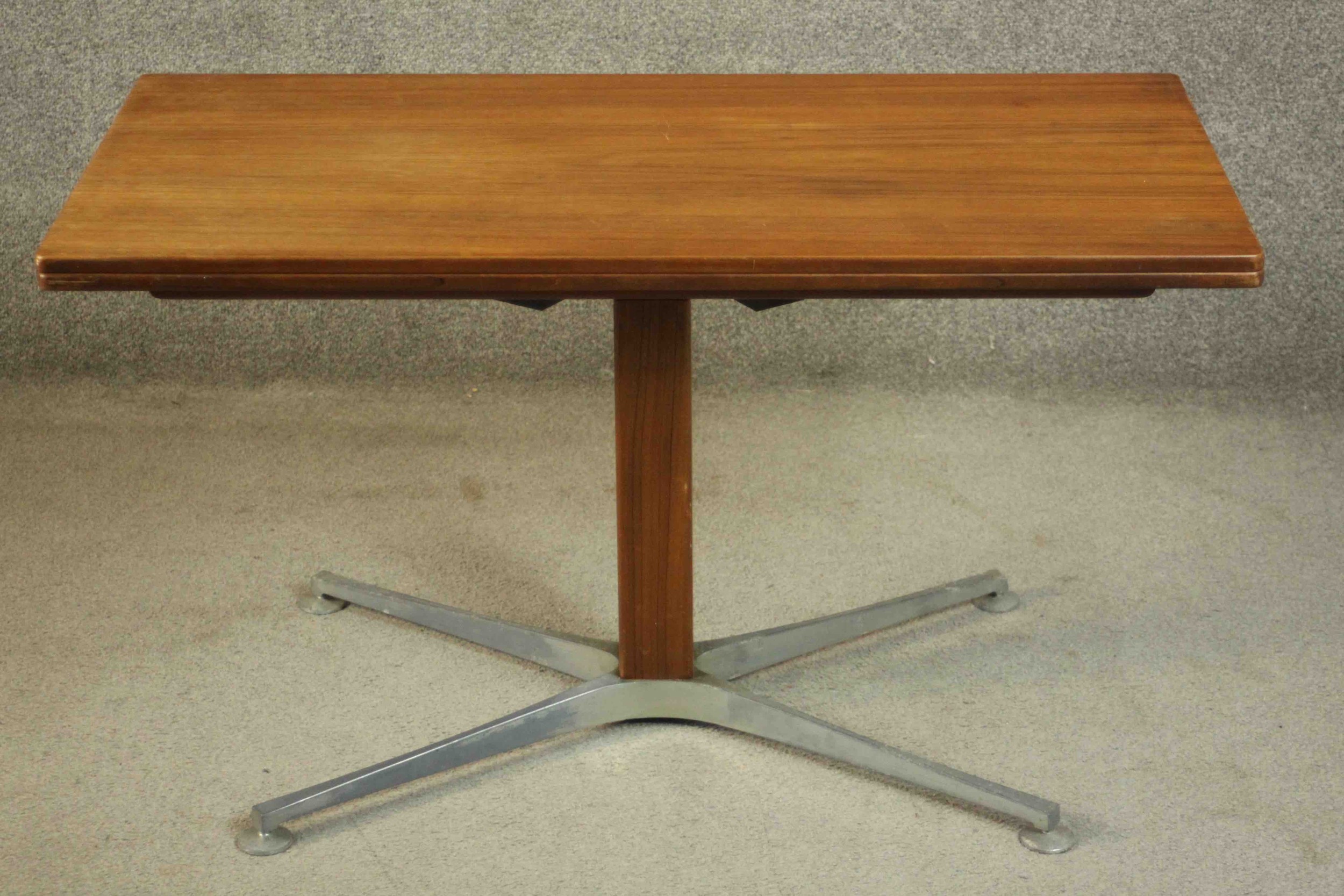 A vintage teak fold over console table converting to dining table with height adjustable mechanism