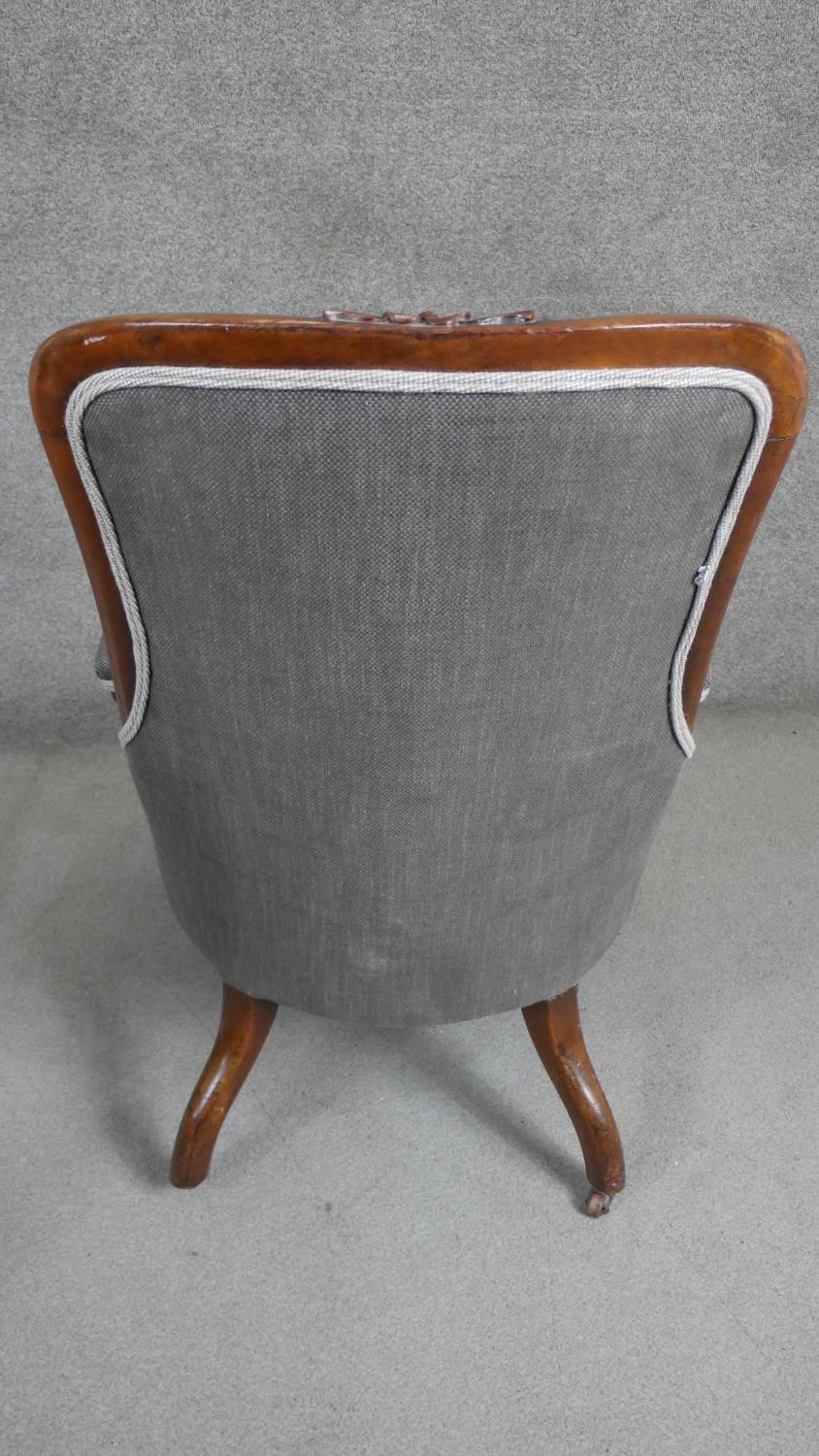 A Victorian walnut open armchair upholstered in grey fabric with a buttoned back over a serpentine - Image 5 of 5