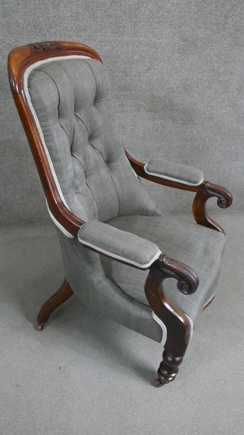 A Victorian walnut open armchair upholstered in grey fabric with a buttoned back over a serpentine - Image 2 of 5