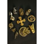 A collection of eleven Metropolitan Museum of Art and other museum replica brooches. Each with